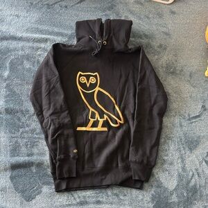 OVO Black Sweater with Gold Owl Design